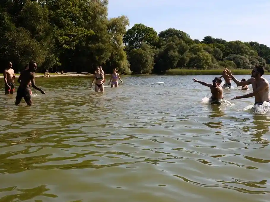Throwing Frisbee and Swimming